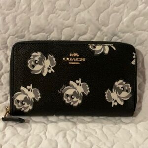Leather zipper wallet with flowers by Coach!